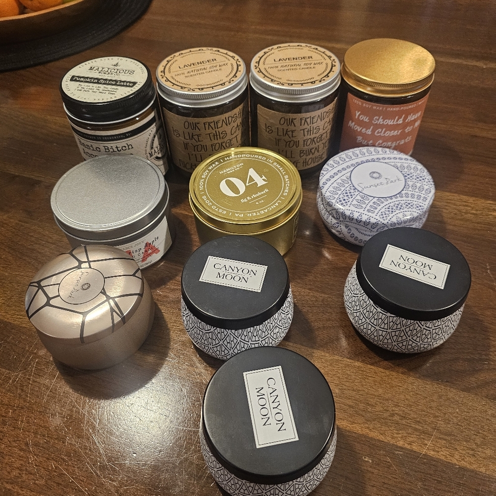 Assorted candles all new some with sayings